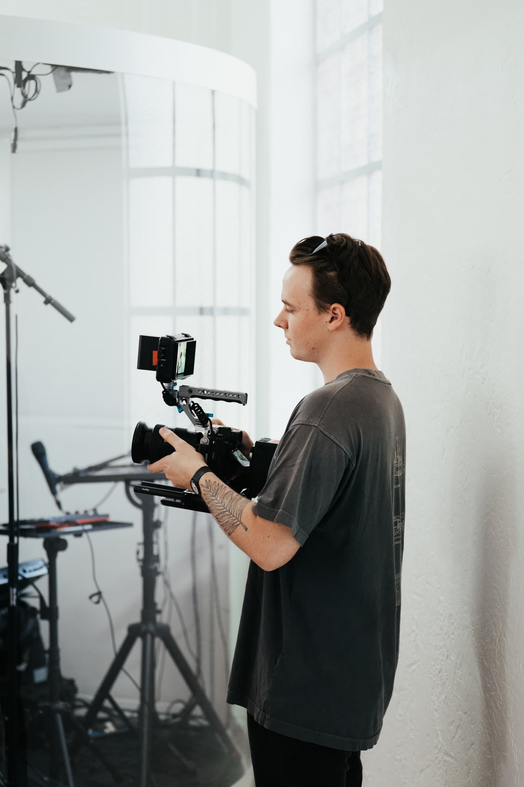 A Harbour Church production team member filming a Sunday gathering