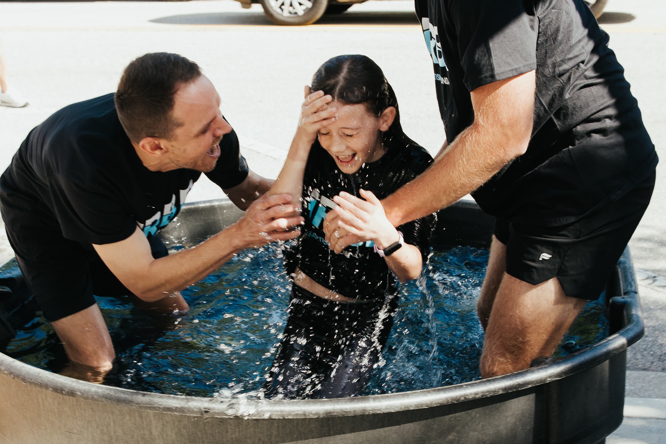 Coming up out of the water at a Harbour baptism