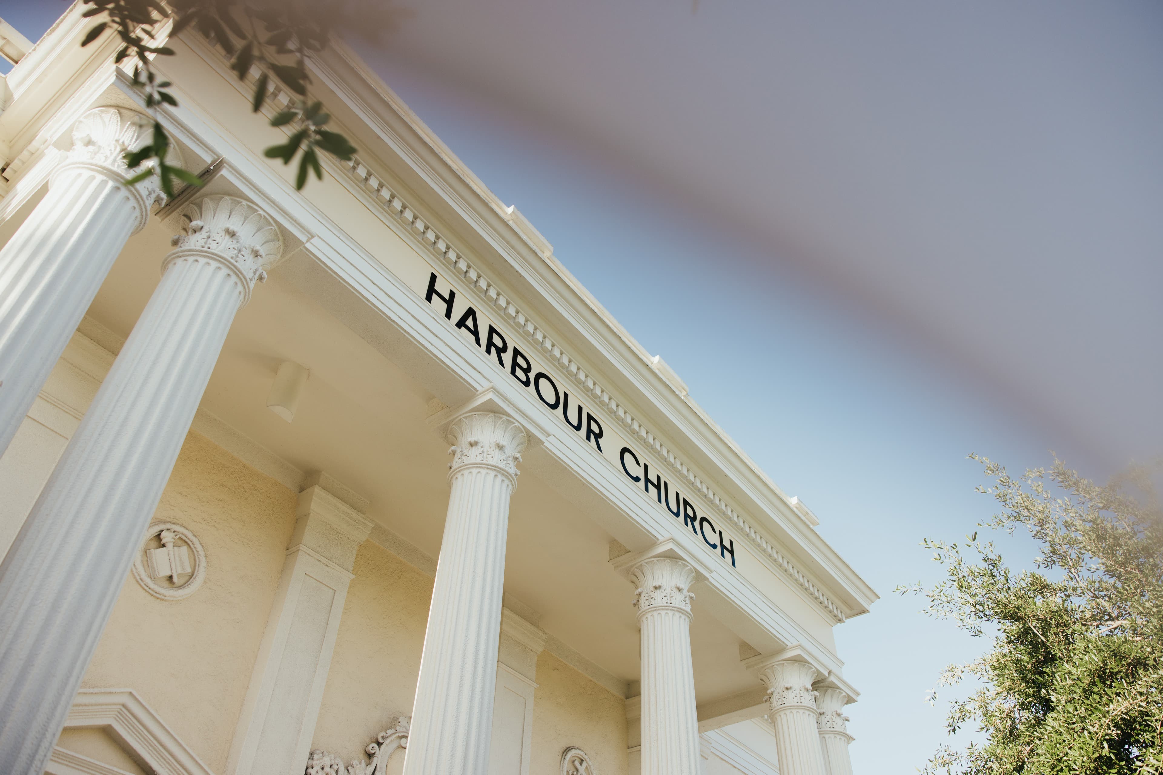 Harbour Church today, with its name above the white columns at the Main Street entrance.